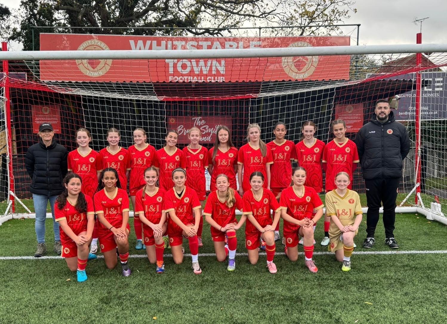 Local girls football team in J&J sponsored kit